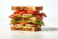 A Sandwich With Bacon, Lettuce, Tomato, And Tomato Slices