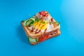 Sandwich with bacon, vegetables and a fried egg. Close-up. view from above. Isolated Royalty Free Stock Photo