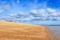 Sandwich Bay shingle beach low tide Kent UK Royalty Free Stock Photo