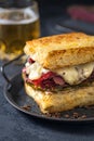 Sandwich with beef pastrami on wooden board Royalty Free Stock Photo