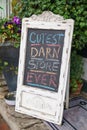 Sandwich board chalk sign - cutest darn store ever Royalty Free Stock Photo