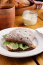 Sandwich bruschetta made from whole grain bread with cheese and spinach. Healthy snack, healthy food Royalty Free Stock Photo