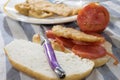 Sandwich with chicken cutlet and tomatoes