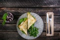 Sandwich with chicken and vegetables on a ceramic plate. Served with cutlery and fresh lemonade. Top view Royalty Free Stock Photo