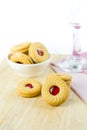 Sandwich cookies with cream and strawberry flavoured jam on whit Royalty Free Stock Photo