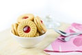 Sandwich cookies with cream and strawberry flavoured jam Royalty Free Stock Photo