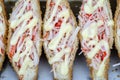 Sandwich with crab sticks and mayonnaise for sell at street food market in Thailand . Tasty sandwich close up Royalty Free Stock Photo