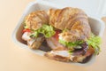 Sandwich of croissant of lettuce, tomato and smoked turkey