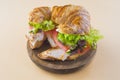 Sandwich of croissant of lettuce, tomato and smoked turkey