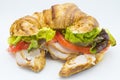 Sandwich of croissant of lettuce, tomato and smoked turkey