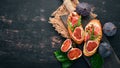 Sandwich with figs, prosciutto and cheese. Royalty Free Stock Photo