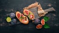 Sandwich with figs, prosciutto and cheese. Royalty Free Stock Photo