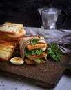 Sandwich of French toast and lettuce leaves and boiled egg Royalty Free Stock Photo