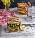 Sandwich of French toast and lettuce leaves and boiled egg Royalty Free Stock Photo