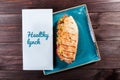 Sandwich from fresh pita bread with fillet grilled chicken, lettuce, slices of fresh tomatoes Royalty Free Stock Photo