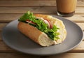 Sandwich with fresh vegetables on a ceramic gray plate. Wooden brown background. A cup with coffee in the background. Vegetarian Royalty Free Stock Photo