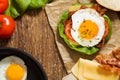Sandwich with a fried egg, bacon and cheese Royalty Free Stock Photo