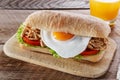 Sandwich with grilled meat egg tomato salad ciabatta Royalty Free Stock Photo
