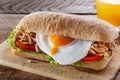 Sandwich with grilled meat egg tomato salad ciabatta Royalty Free Stock Photo