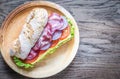 Sandwich with ham, cheese and fresh vegetables Royalty Free Stock Photo