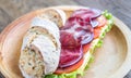 Sandwich with ham, cheese and fresh vegetables Royalty Free Stock Photo