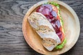 Sandwich with ham, cheese and fresh vegetables Royalty Free Stock Photo