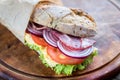 Sandwich with ham, cheese and fresh vegetables Royalty Free Stock Photo