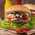 Sandwich hamburger with juicy burgers, cheese Royalty Free Stock Photo