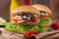 Sandwich hamburger with juicy burgers, cheese Royalty Free Stock Photo
