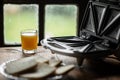 sandwich maker and a glass of juice on the background of an old-fashioned window. Preparing a quick morning breakfast, snack