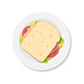 Sandwich on plate top view. Slice of bread with cheese, tomato, salad, ham