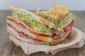 Sandwich or salad served on a wooden table Royalty Free Stock Photo