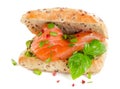 Sandwich with salmon for healthy breakfast isolated on a white. Royalty Free Stock Photo