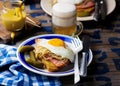 Sandwich with sauerkraut , ham and fried eggs Royalty Free Stock Photo