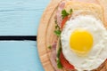 Sandwich with smoked pork, tomato and fried egg Royalty Free Stock Photo