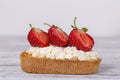 Sandwich of strawberry and cottage cheese on wooden table, close up Royalty Free Stock Photo