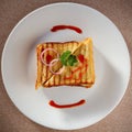 A sandwich in a white ceramic plate with sauce Royalty Free Stock Photo