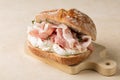 Sandwich with whole wheat bread prosciutto cotto, italian ham and soft cheese