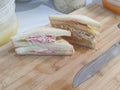 Sandwich on wooden chopping board. Crab Stick Sandwich , Flossy Pork Sandwich.