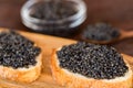 Sandwiches with black sturgeon or beluga caviar close up Royalty Free Stock Photo