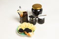 Sandwiches with black sturgeon caviar, lemon slice and tartlet with black caviar on a plate. Royalty Free Stock Photo