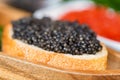 Sandwiches with black sturgeon and red salmon caviar close up Royalty Free Stock Photo