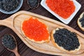 Sandwiches with black sturgeon and red salmon caviar close up Royalty Free Stock Photo