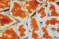 Sandwiches and boiled eggs coated with mayonnaise with red caviar Royalty Free Stock Photo