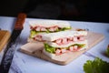 Sandwiches, bread stuffed with crab sticks and ham, mayonnaise and vegetables Royalty Free Stock Photo