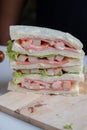 Sandwiches, bread stuffed with crab sticks and ham, mayonnaise and vegetables Royalty Free Stock Photo