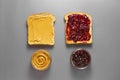 Sandwiches or bread toast with peanut butter and fruit jelly. Top view