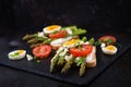 Sandwiches with caramelized asparagus, feta cheese.