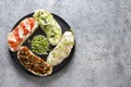 Sandwiches on ciabatta toast with fresh vegetables, radishes, tomatoes, cucumbers and microgreens. View from above Royalty Free Stock Photo