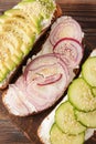 Sandwiches with , cucumber , cheese and avocado slices, red onion , top view Royalty Free Stock Photo